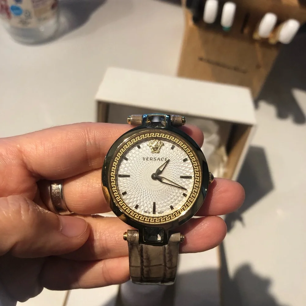 Versace White Dial Watch with Gold Bezel and Brown Strap